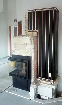 wasserf&uuml;rende Speicher&ouml;fen, Wasserf&uuml;hrende Grund&ouml;fen, wasserf&uuml;hrende Kachel&ouml;fen, heizen mit holz, geg, heizungsgesetz, ofenmanufaktur francesco maio, ofenbauer im saarland, ofenbau tholey, ofenbau kreis St.wende, kaminbauer im saarland, heizkamine, feuer, holzofen